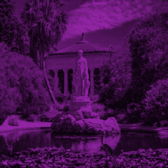 Image of a statue in the middle of a botanical garden in Huntington Library, CA