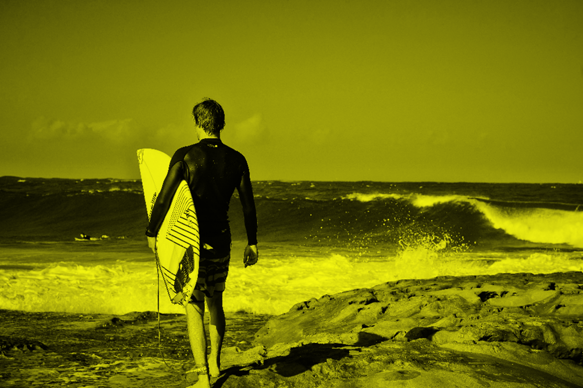 man with a surf board